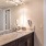 brightly lit vanity sink counter in bathroom