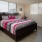 windows provide natural light in furnished bedroom